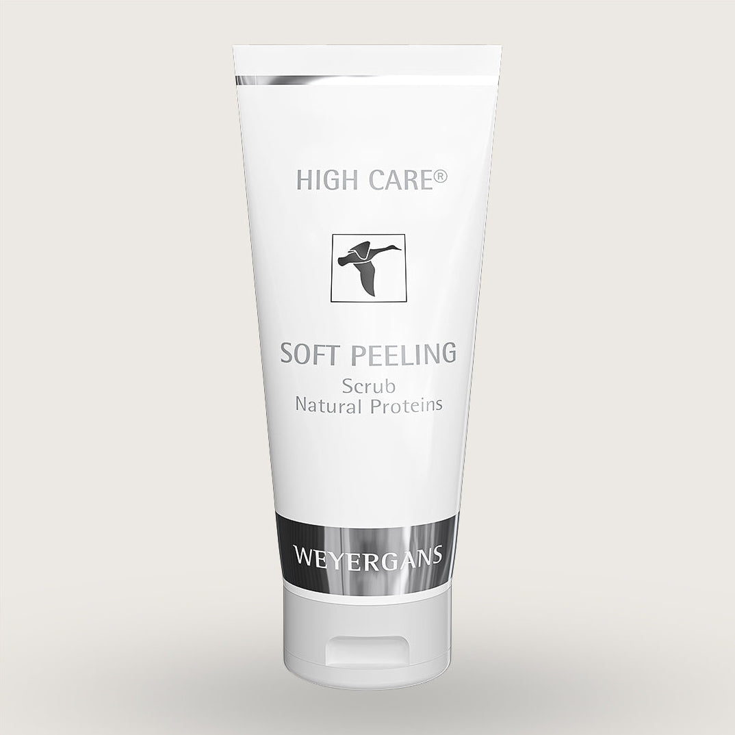 Tubetto di scrub esfoliante delicato High Care di Weyergans su sfondo biege.
