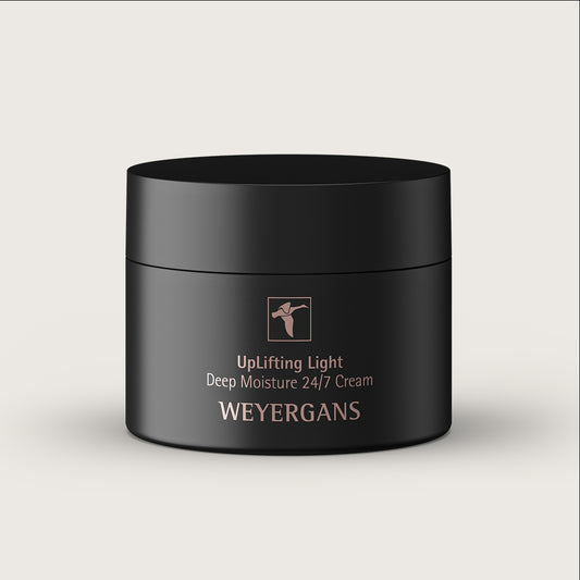 Vasetto nero di crema Weyergans UpLifting light moisture 24/7 su sfondo beige.